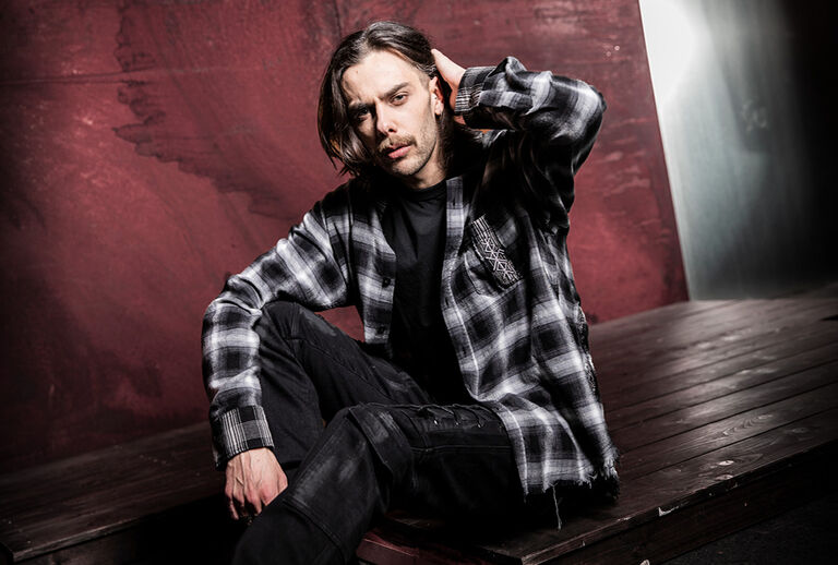 Pagan Roots / This Pagan Roots collection draws on ancient symbolism: runes, protective circles and folkloric signs that look as if they were carved from ritual wood. Black and dark red tones with rough washes are reminiscent of earth, embers and nocturnal ceremonies.Each piece visibly bears this symbolic world on the skin &ndash; sometimes as a large-scale symbol, sometimes as a subtle background reminiscent of weathered frescoes. The designs look like modern artefacts from pagan rites and folklore.New oversized fits create a powerful silhouette that straddles ritual garb and streetwear. Clothing that looks as if it has its roots deeply anchored in ancient soil. / Discover now!